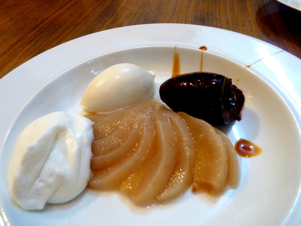 Poached Pear, Sea-salt Dark Chocolate Ganache, Vanilla Ice-Cream, Unsweetened Whipped Cream, Caramel Sauce
