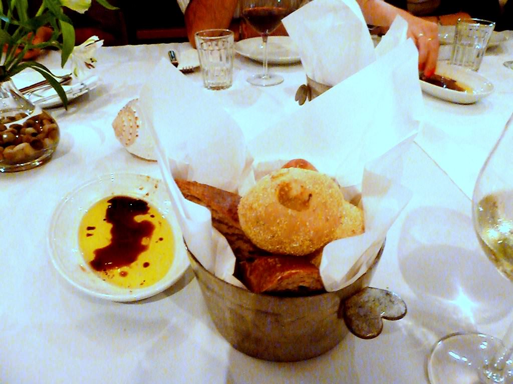 P1200763.JPG Fresh bread basket (19 NIS) with olive oil and balsamic vinegar. A selection of three types of bread. all excellent, fresh, warm. Addictive.