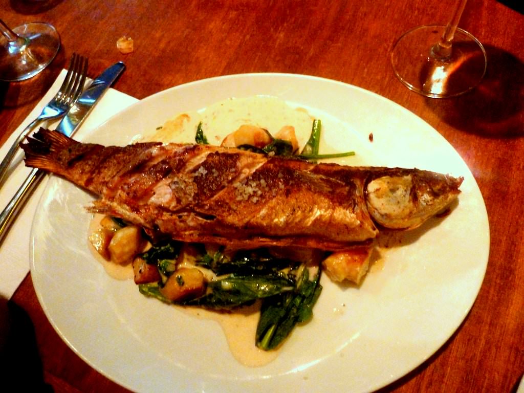 P1200887.JPG Grilled whole Grey Mullet, almond milk sauce, roasted almonds, Ratta Potatoes, spinach (142 NIS). I took control of filetting the fish and serving to all. This dish was problematic though. No plate for the bones and head made it very sloppy, the sauce was too delicate for the not so delicate grill fish and it washed off. The potatoes were boring and the roasted almonds were nowhere to be found. I liked the spinach but this dish needs to be refined.