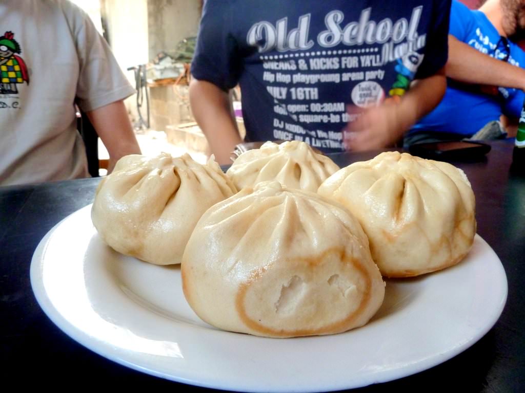 P1210001.JPG <strong>Bao (7 NIS for one).</strong> Chinese steamed yeast bun filled with meat of some kind. Delicious.