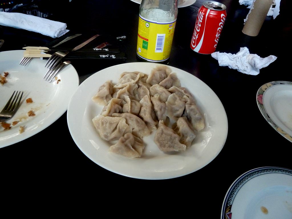 P1210012.JPG A large plate of cooked Chinese dumplings (30 NIS)