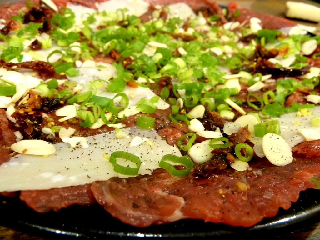 Parmesan, green onions, sun dried tomatoes, almonds and hazelnut oil