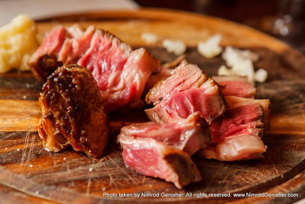 Prime Rib, aged and juicy Entrecote on the bone from a senior cow.