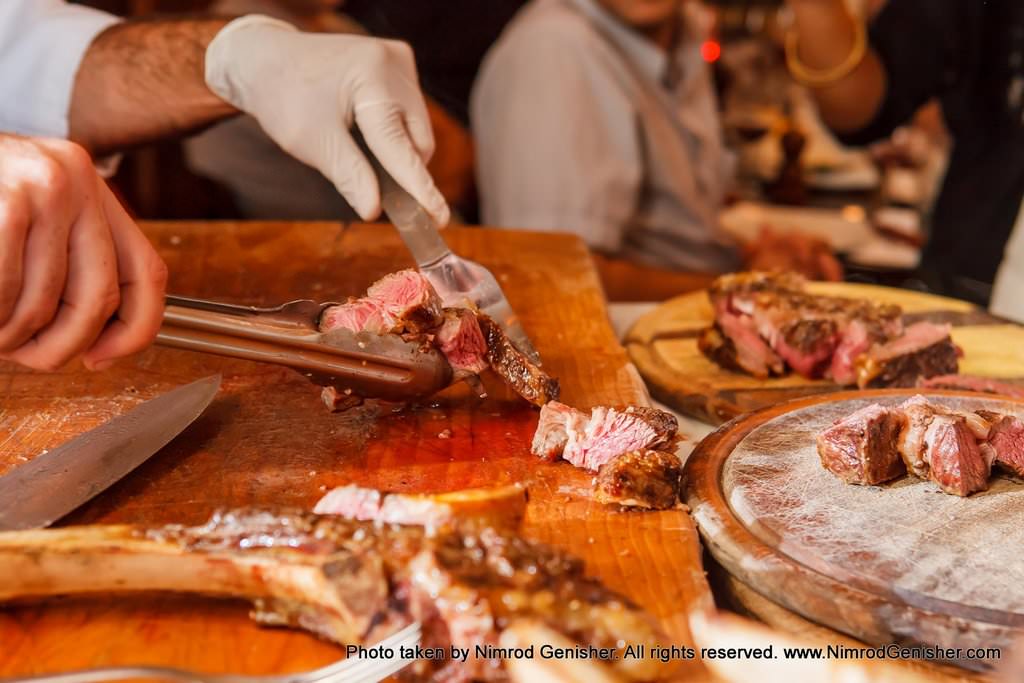Prime Rib, aged and juicy Entrecote on the bone from a senior cow.