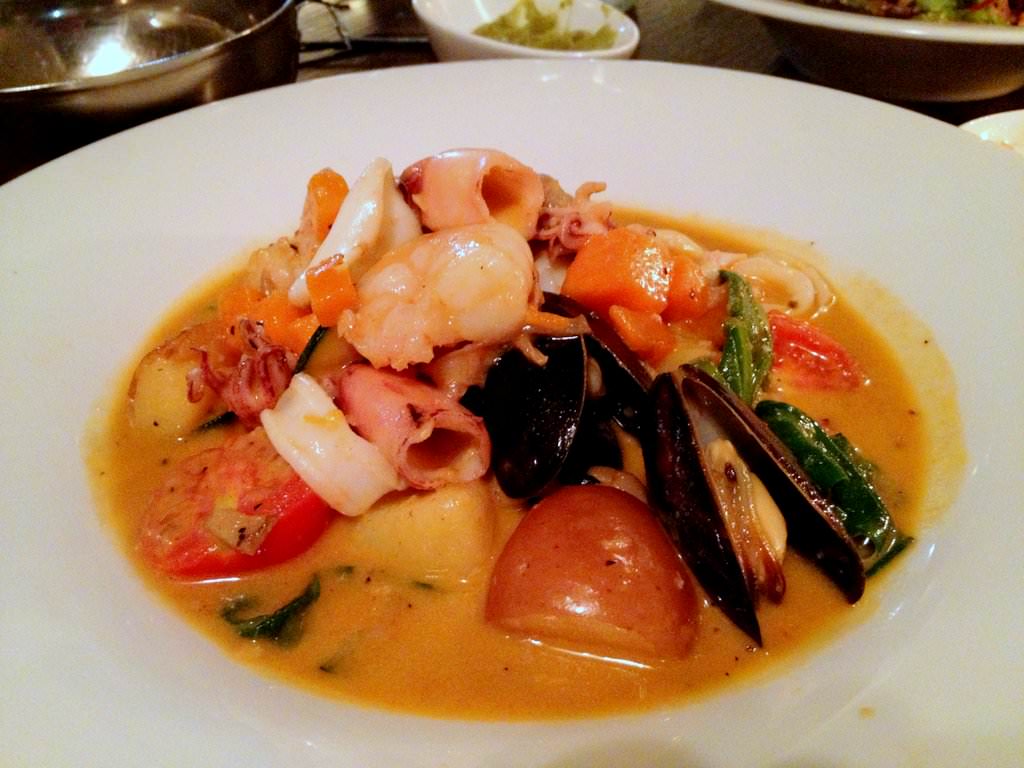 IMG_0029.JPG Shrimp, calamari and mussels panache in a fish broth with tomato, spinach, cream and saffron. Nice classic seafood dish, I liked it.