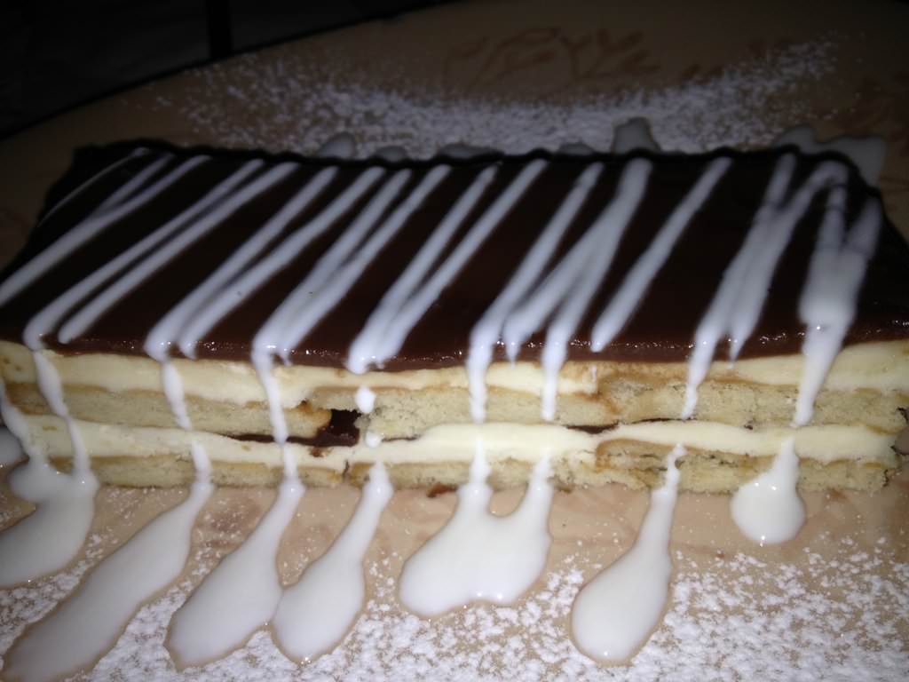 IMG_0138.JPG Childhood Biscuit Cake, vanilla cream and chocolate on top (32NIS). This dessert won thanks to nostalgia.