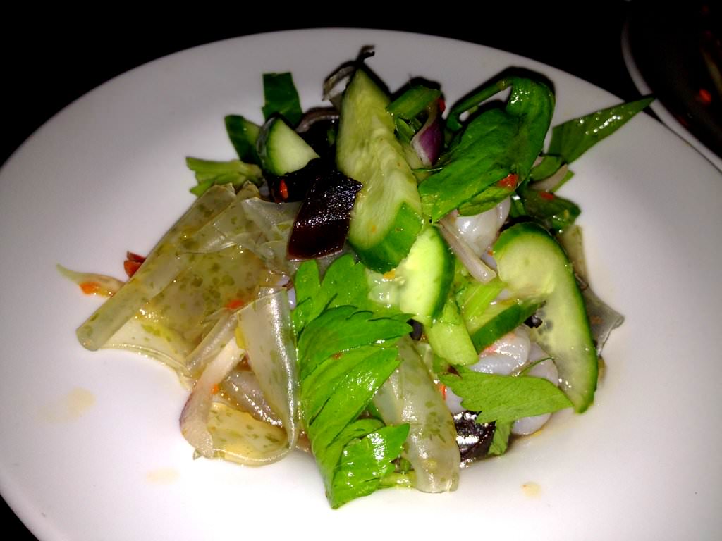 Cucumber and shrimp salad, wide bean noodles and seaweed. It was sweet and sour and a very light and fun dish.