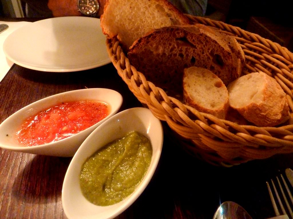 P1210967.JPG Basket of sourdough bread and focaccia from the bakery accompanied by tapenade of black olives and fresh tomato salsa. What we got was eggplant spread instead of tapenade. The bread was tasty, the tomato salsa was ordinary.