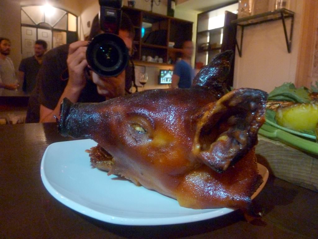 Whole piglet marinated in Calvados, honey and apples.