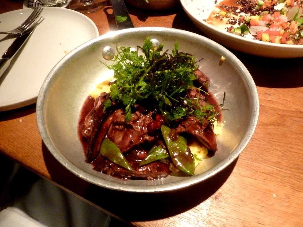 Scorched Chicken Liver, Mămăligă, Wild Mushrooms, Bacon, Asparagus in Butter (73 NIS).