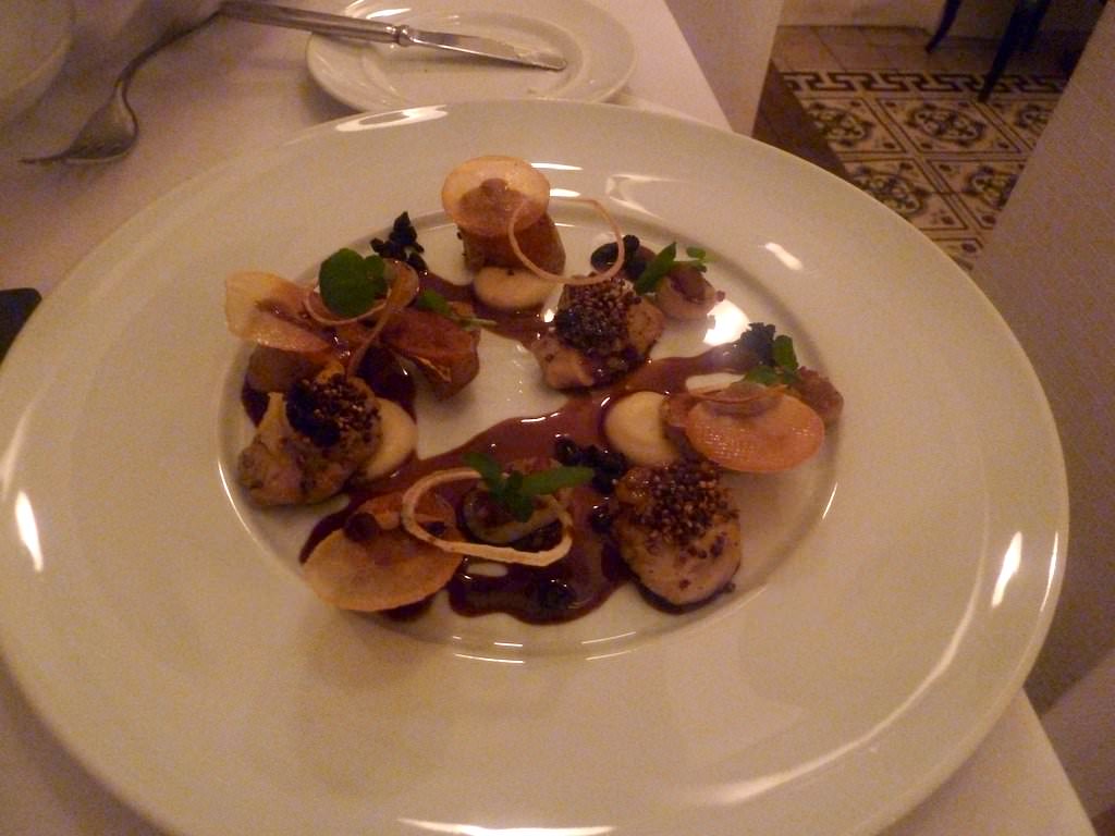 Veal marrow "Sofrito", sage butter, garlic confit, crispy quinoa seeds in spices, Ratte fries, garlic cream, variations of onion, lamb pancetta, red wine and juniper sauce (97 NIS).