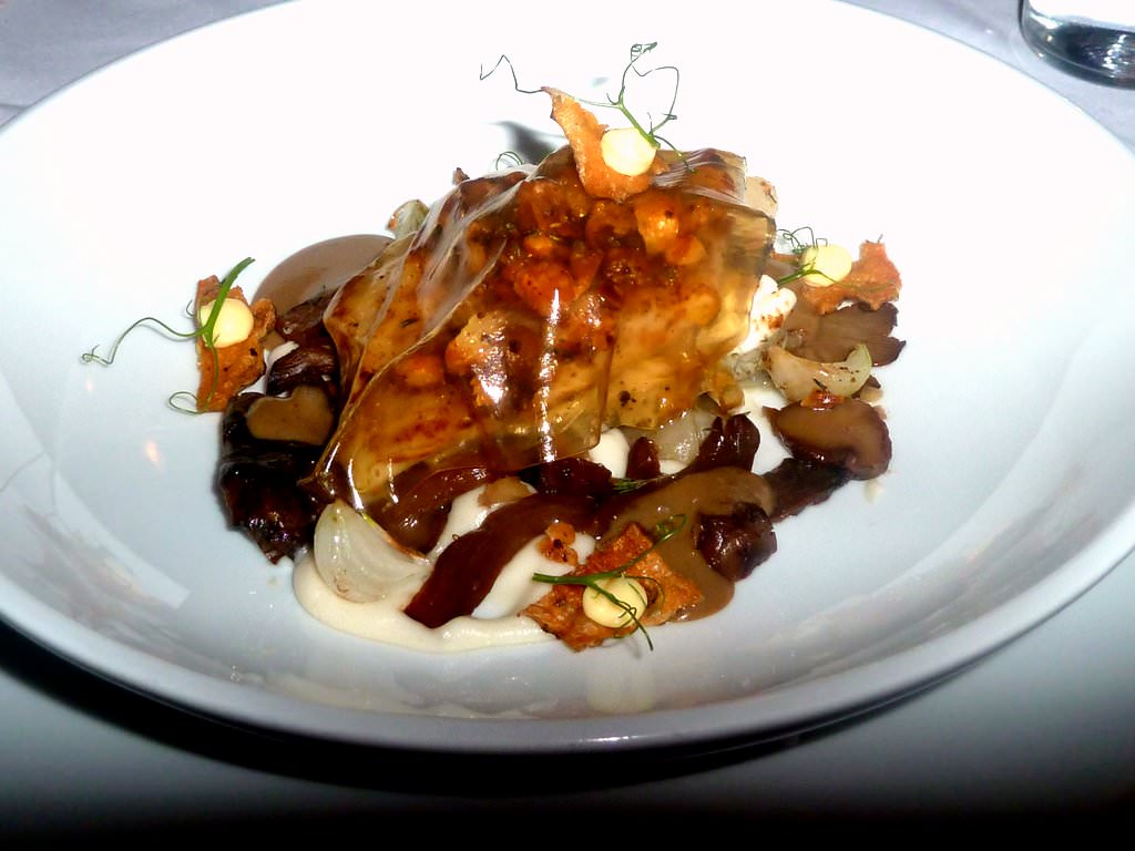 Fillet of bar, caramelized macadamia nut butter, thyme, jelly consommé, shitake mushrooms, Jerusalem artichoke, wild mushrooms, pearl onions, porcini butter and Gruyère patissiere (189 NIS). Delicious earthy dish, although the fish well cooked - it's not the center of attention here. There's an entire winter forest bursting out of the plate and I loved it.