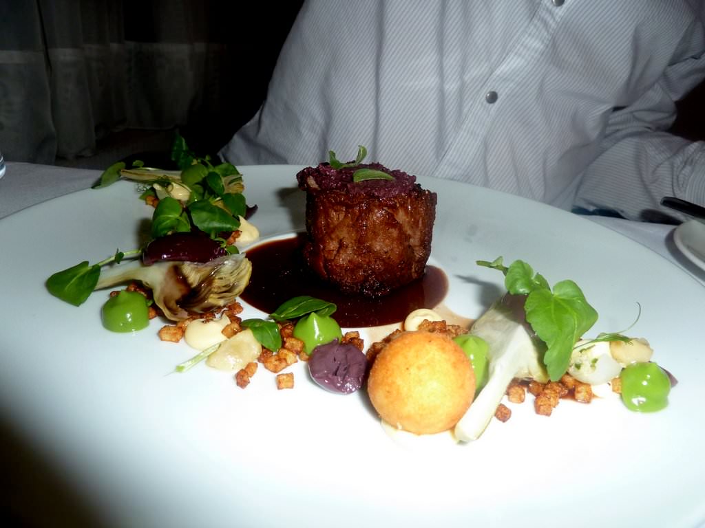 Mediterranean veal Fillet, olives-za'atar tapenade, young artichoke, garlic cream "kromesky", parsley coulis, Ratte fries, pearl onions filled with bulgur and herbs, red wine sauce (197 NIS).
