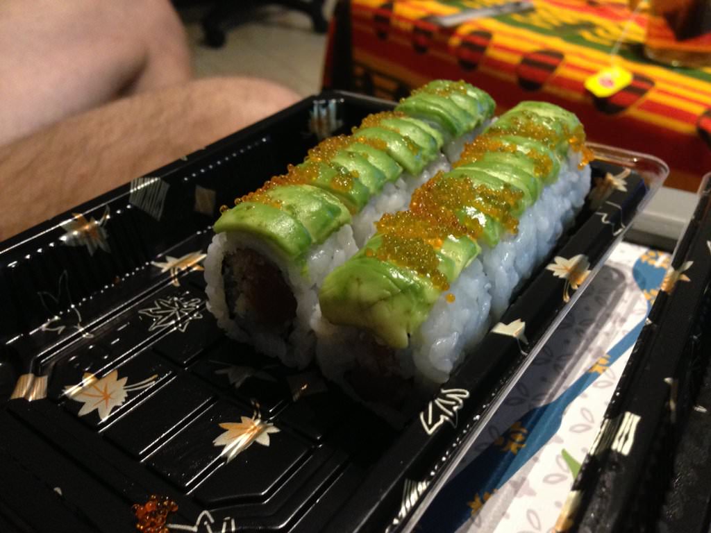 Soy marinated salmon, tempura, asparagus, avocado, tobico (52 NIS)