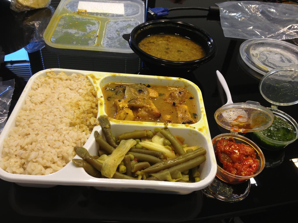 Business Curry thali: Pieces of chicken breast cooked in coconut milk. Served with brown rice, vegetables in curry, lentil soup and a cold chai drink (40.8 NIS). I love Indian food but that's not honoring Indian food. The best thing about it was the green little spicy chutney. The rice was okay. The chicken pieces were dipped in a bad sauce after being cooked elsewhere and I had burnt pieces inside. The rest was just bland.