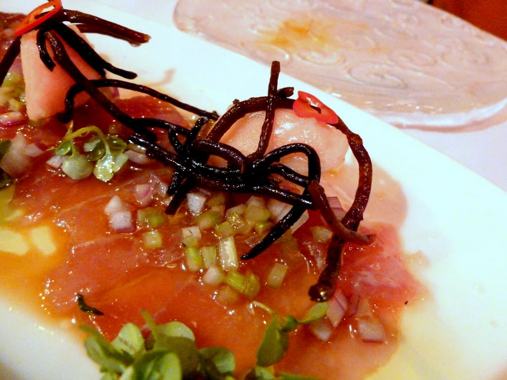 Tuna carpaccio with lemon grass Campari sorbet and pickled algae (62 NIS)