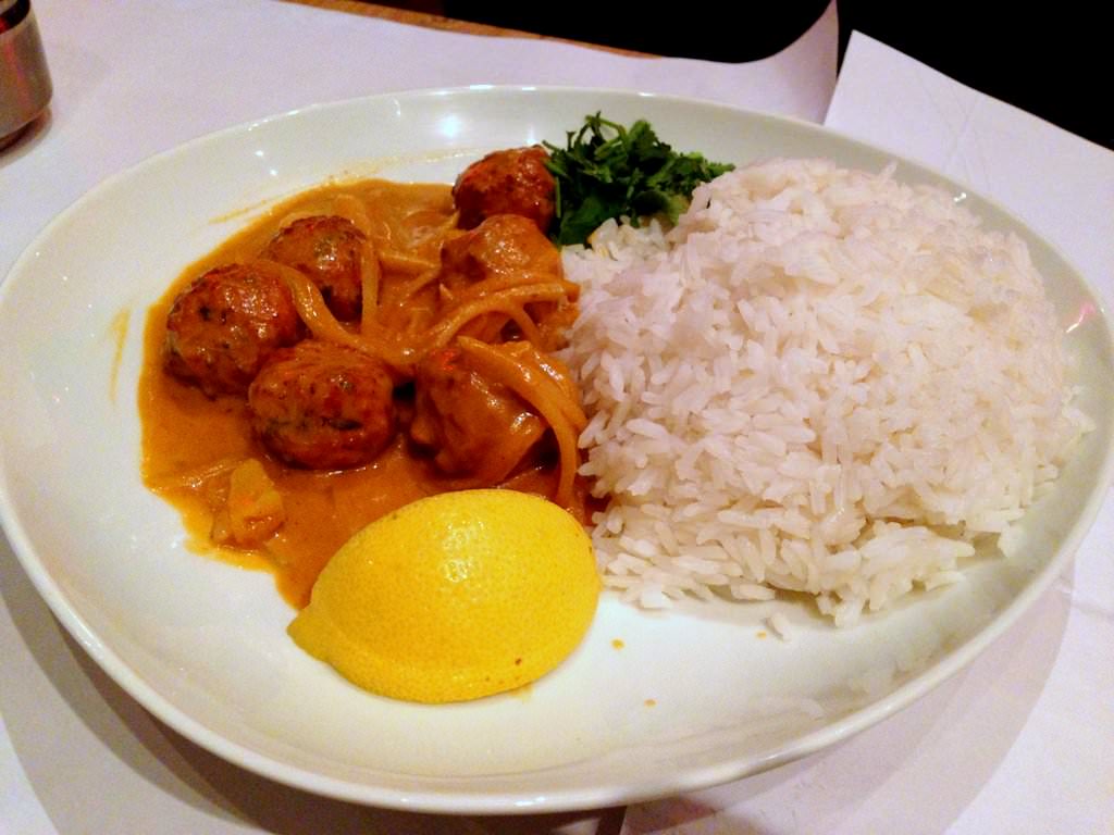 Chicken and ginger meatballs with coconut curry sauce and pineapple.