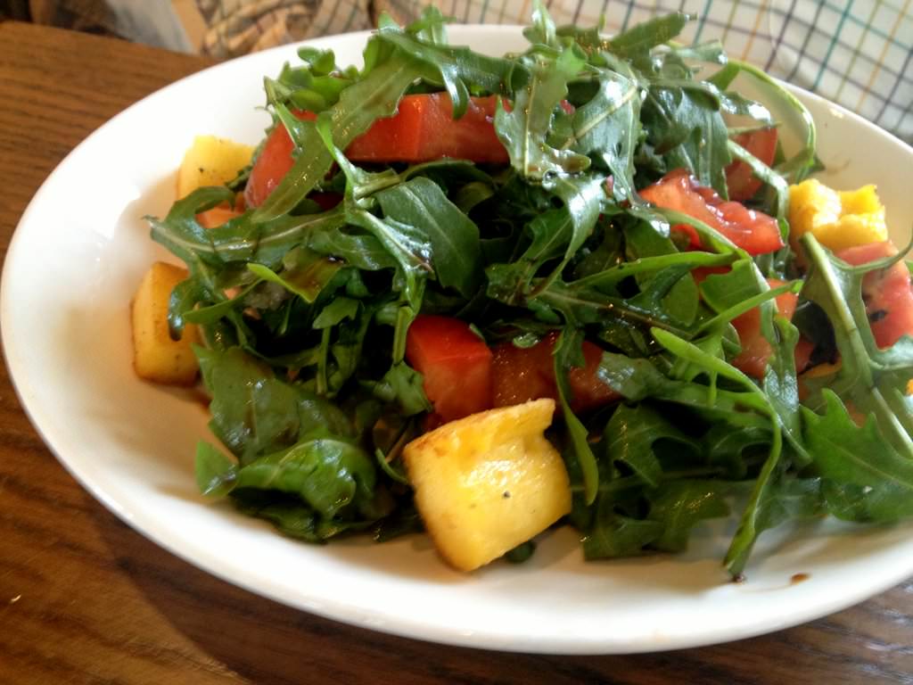 The Tomato and rocket salad with polenta
