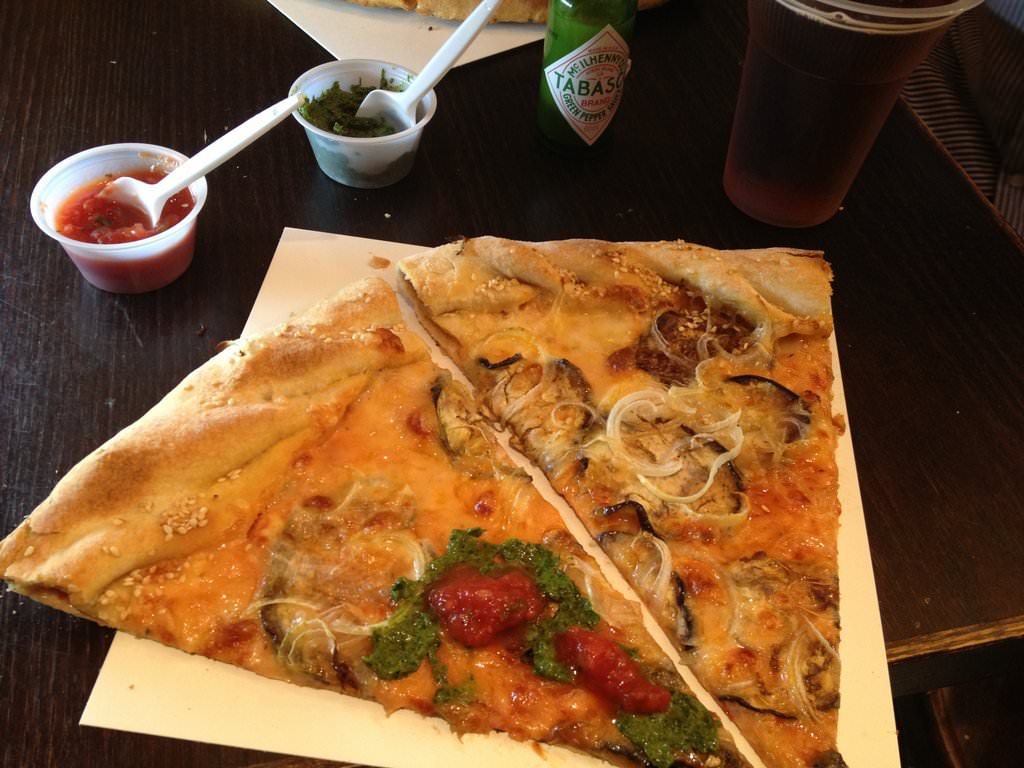 Bazili.com Pizza. Self-service salsa and pesto.