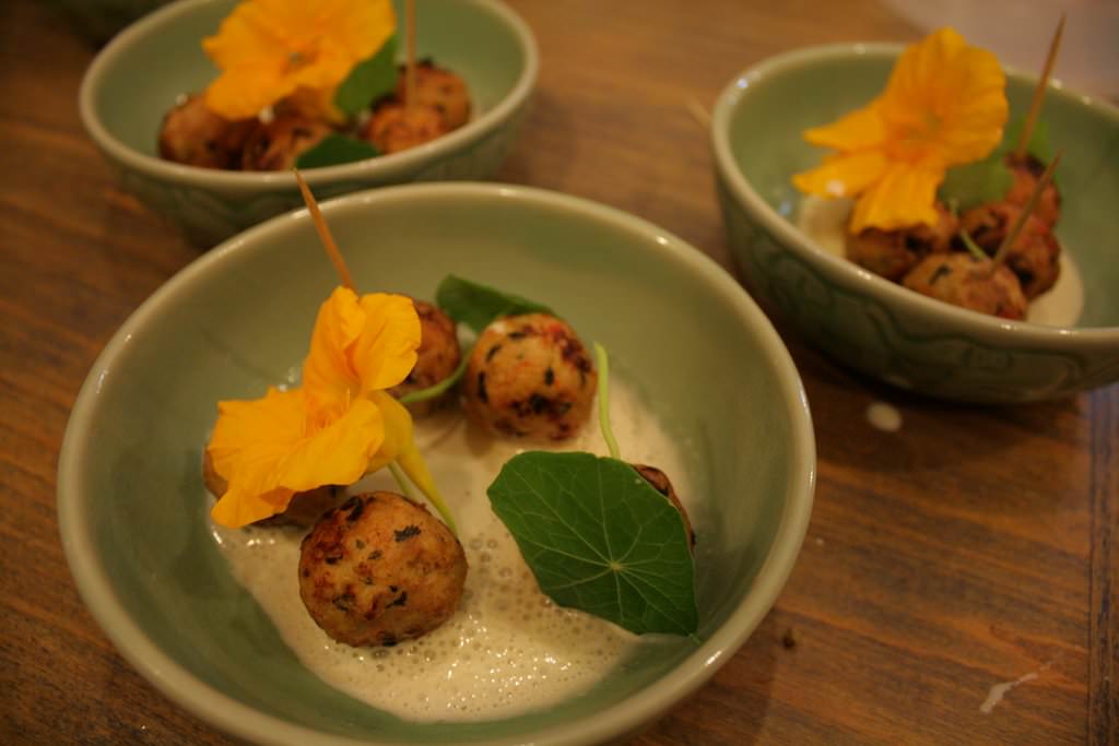 The Thai dish: Chicken ginger and coriander balls, green curry, lemongrass and coconut espuma, Capucine flower and leaf