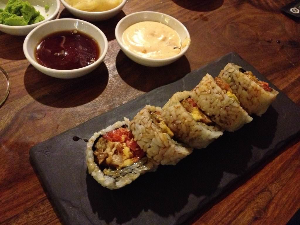 Bling bling uramaki: chopped spicy tuna, soft shell crab tempura, avocado sauce onagi (32 ILS).
