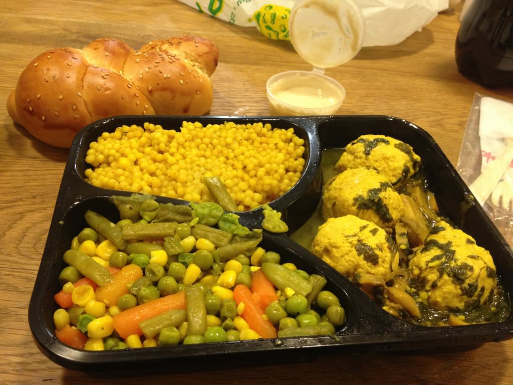 Chicken balls with champignon sauce, Israeli couscous and cooked vegetables with tahini, small salad and a bun (40 ILS)