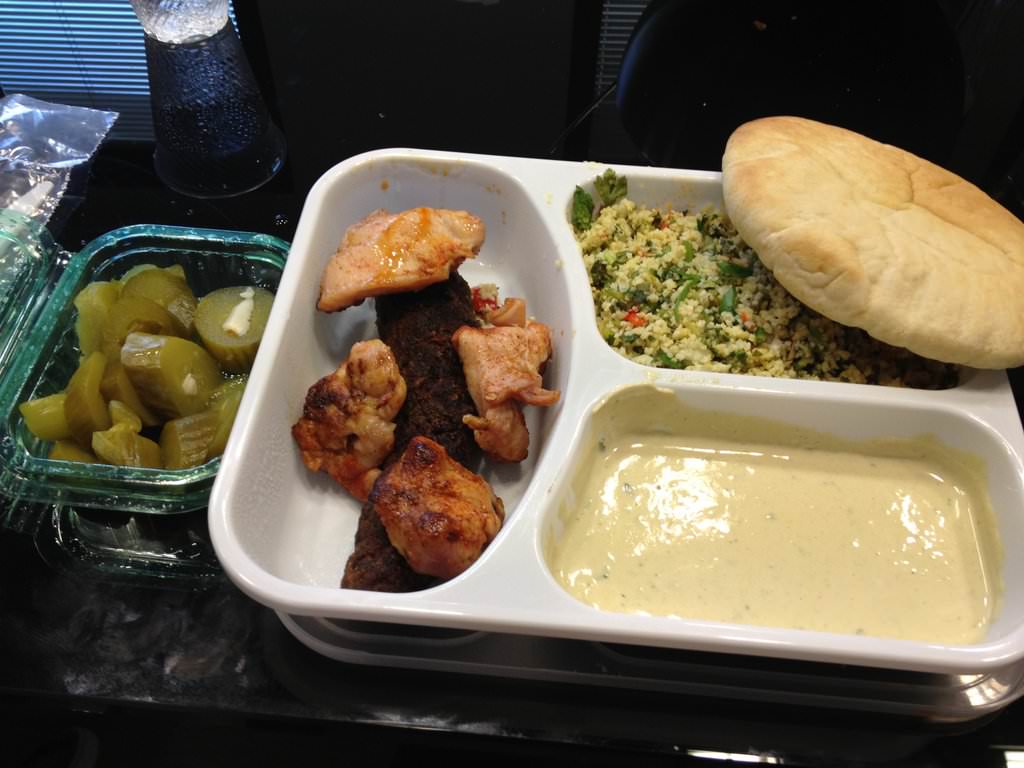 Shish Kebab of chicken and beef with Tabule and tehini, pickles and pita (33 ILS).