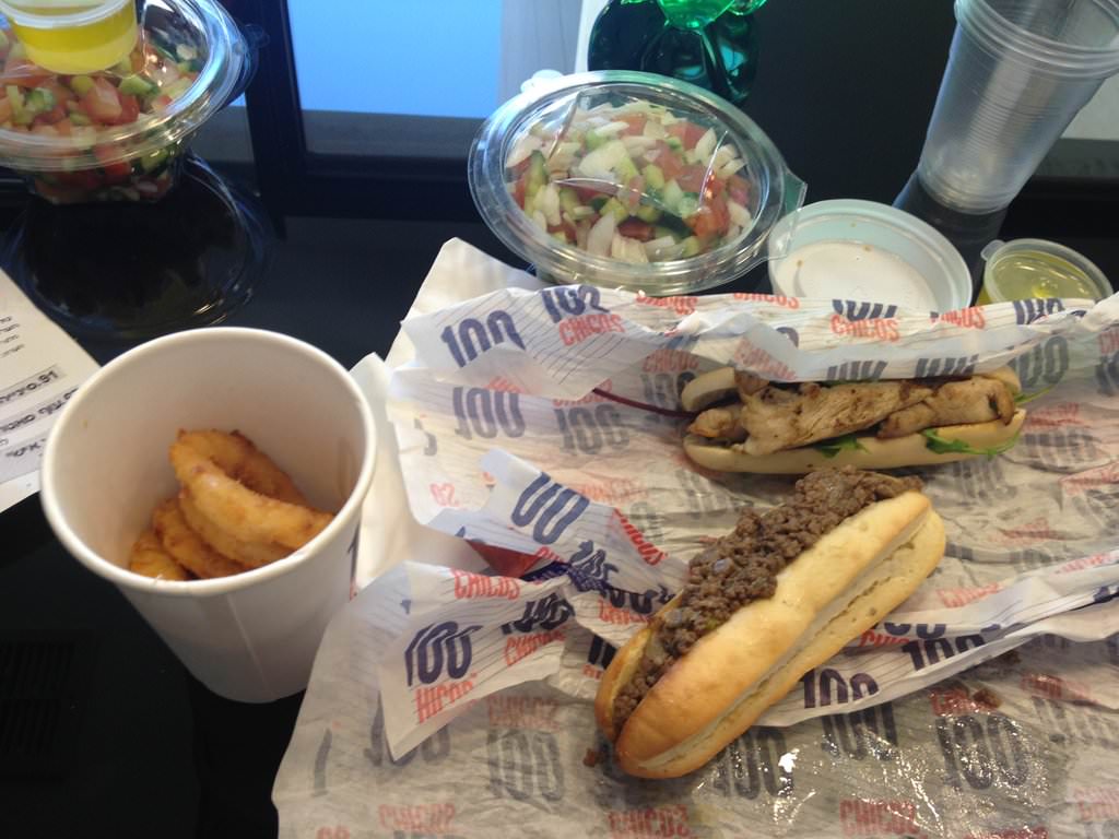 Lamb Saniyah and chicken sate sandwiches, small salad and small onion rings (37 ILS).
