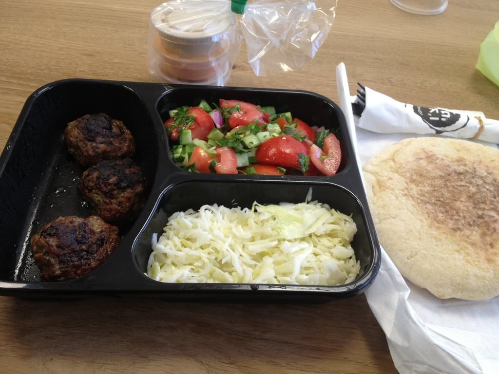 3 Lamb and beef meat balls, with two fresh salads, tomatoes and cabbage (30 ILS). Came with two little spicy sauces - one spicy eggplant and one pickled lemons and a Pita bread.