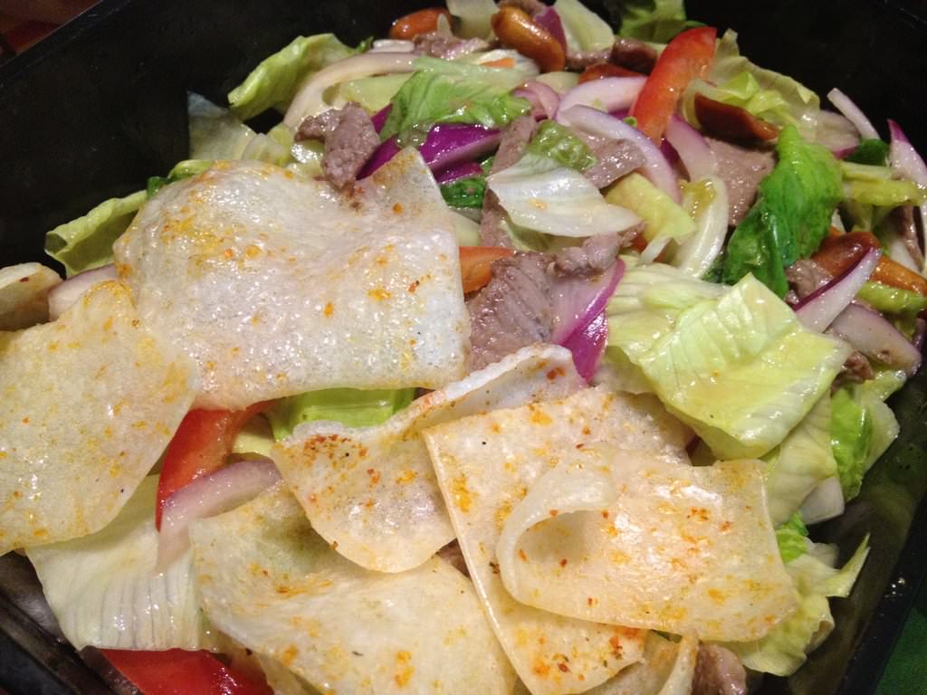 Spicy Cambodian beef salad: Rice noodles, watercress, crispy shallots, red onion, red chilli, mint, coriander, tamarind and peanuts (44 ILS)