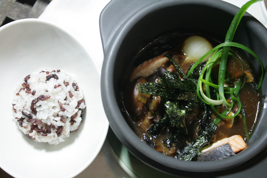 Fish and mushroom Japanese style stew in a hot clay pot / Pearl onions and mushrooms / Salmon and Corvina / Nori Seaweed / Aromatic rice