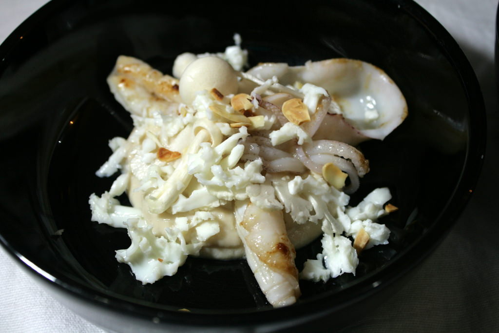 The White Dish: Cauliflower-Almond Cream, Baby Squid, White Shimaji, Roasted Almonds, Fresh Shreds of Cauliflower and Egg Whites.