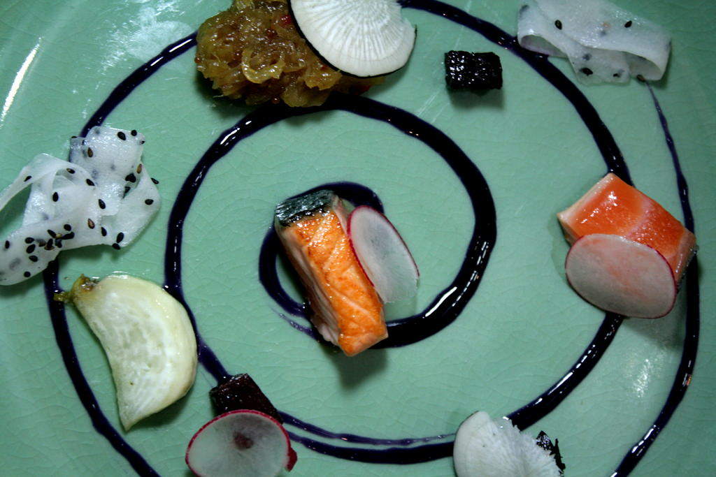 Winter Candies: spiral of red cabbage and ginger sauce, salmon semi cooked, fennel and Arak marmalade, roasted beet cubes, butter glazed turnips, pickled daikon with black sesame, thin slices of radishes and black radish.